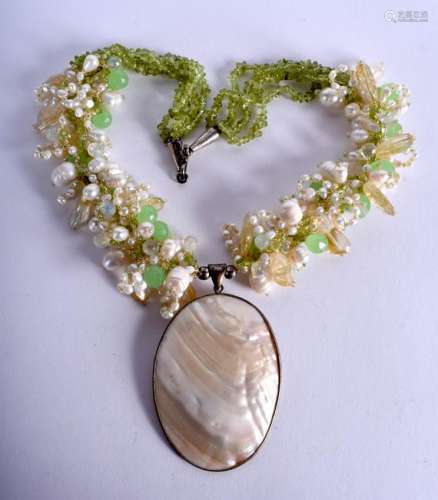 A MOTHER OF PEARL NECKLACE.