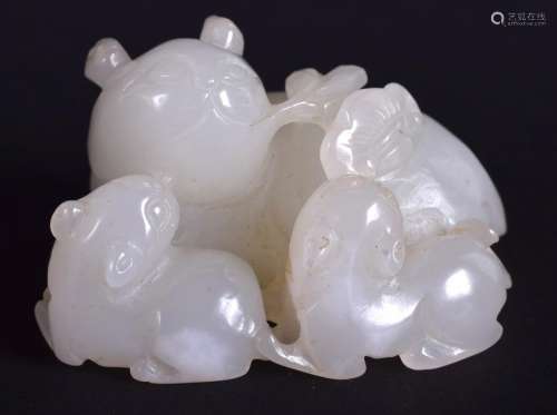 AN EARLY 20TH CENTURY CHINESE CARVED WHITE JADE FIGURE