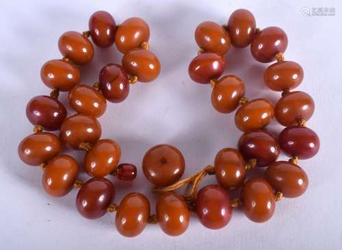 A MIDDLE EASTERN HONEY AMBER NECKLACE. 120 grams. 54 cm