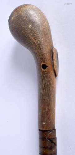 A 19TH CENTURY HORN HANDLED WALKING CANE of sectional