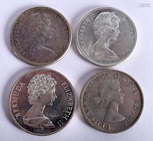 FOUR SILVER DOLLARS. (4)