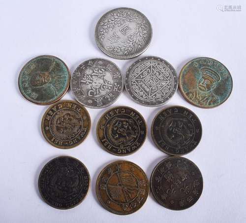 ELEVEN CHINESE COINS. (11)