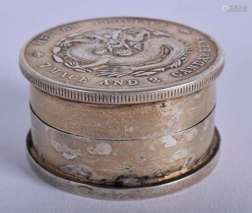 A CHINESE COIN BOX. 4 cm diameter.