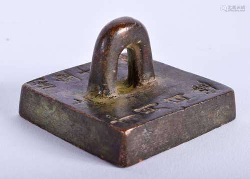 A CHINESE BRONZE SEAL. 5 cm square.