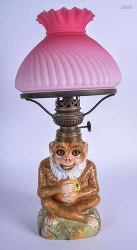 A RARE EDWARDIAN NURSERY OIL LAMP IN THE FORM OF A