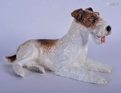 A RARE REG JOHNSON PORCELAIN FIGURINE OF A FOX TERRIER,