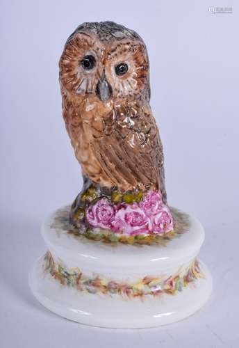 A MICHAEL SUTTY PORCELAIN FIGURINE OF AN OWL. Modelled