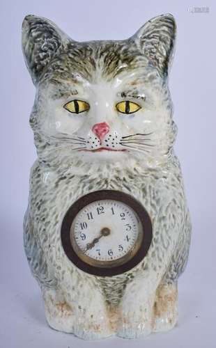 A PORCELAIN CAT CLOCK FIGURAL CASE, modelled seated. 23