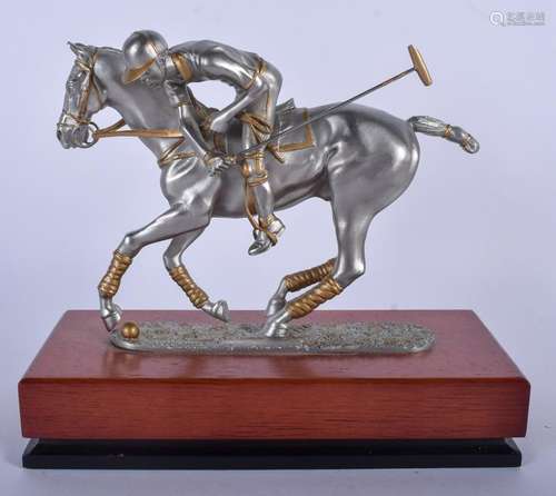 A ROYAL SELAMOOR PEWTER FIGURINE OF A POLO PLAYER,