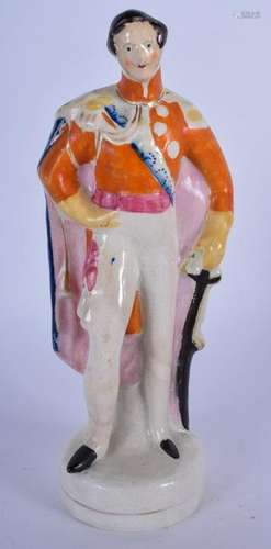 A STAFFORDSHIRE POTTERY FIGURINE IN THE FORM OF THE