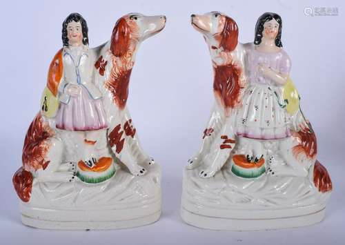 A PAIR OF 19TH CENTURY STAFFORDSHIRE POTTERY POODLES,