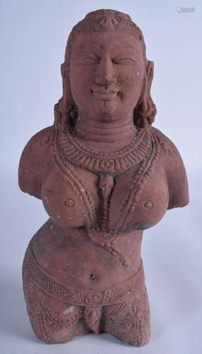 A CAMBODIAN STONE STATUE, formed with enlarged breast