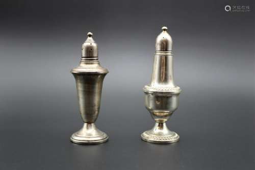 Two antique sterling silver salt and pepper shakers