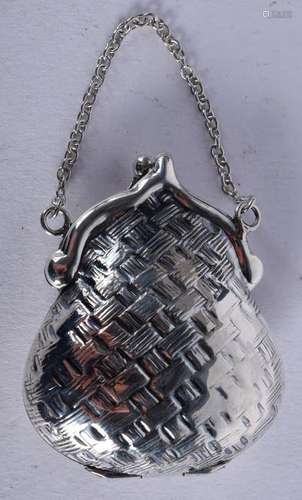 A SILVER PURSE. 4.5 cm wide.