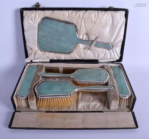 AN ART DECO SILVER AND SHAGREEN DRESSING TABLE SET