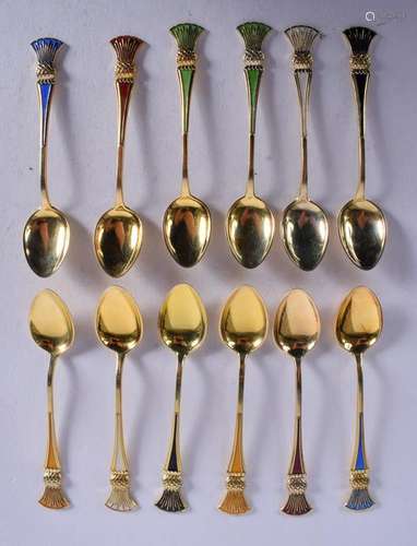 TWELVE SILVER GILT AND ENAMEL SPOOONS. 3.4 oz. (12)