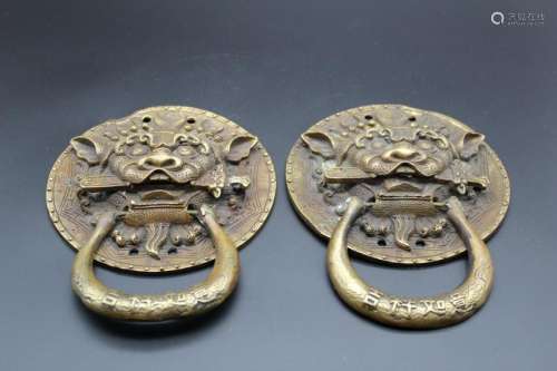 A pair of  bronze Chinese tiger head door knockers