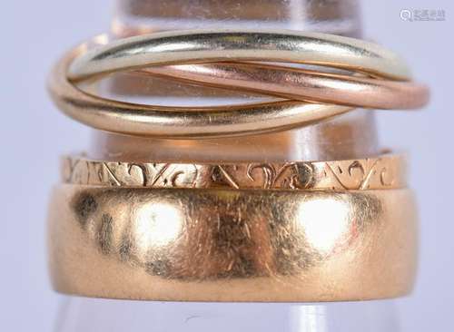 TWO 18CT GOLD RINGS together a 9ct triple ring. 18 ct 7