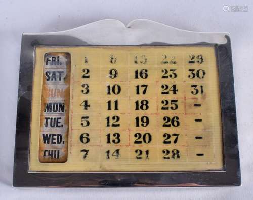 AN ENGLISH SILVER AND IVORINE STRUT DESK CALENDAR. 12