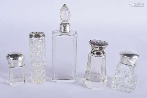 FIVE VINTAGE SILVER TOPPED GLASS DRESSING TABLE JARS.