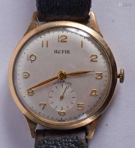 A VINTAGE BOXED HEFIK WRISTWATCH. 3 cm wide.