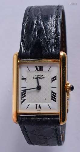 A BOXED CARTIER WRISTWATCH. 2.25 cm x 2.5 cm.