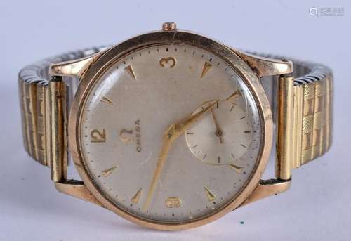 A VINTAGE 9CT GOLD OMEGA WRISTWATCH. 3 cm diameter.