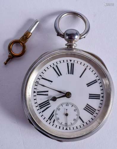 AN ANTIQUE SILVER POCKET WATCH. 5 cm diameter.