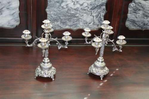 A pair 1893-1923 American 900 silver candlesticks