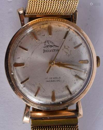 A VINTAGE GOLD HELVETIA INCABLOC WRISTWATCH. 55.6 grams