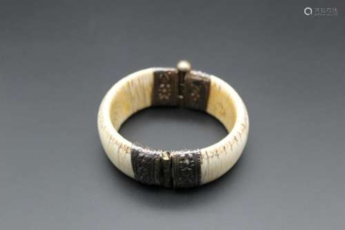 150 -300 years old bone with siver bracelet