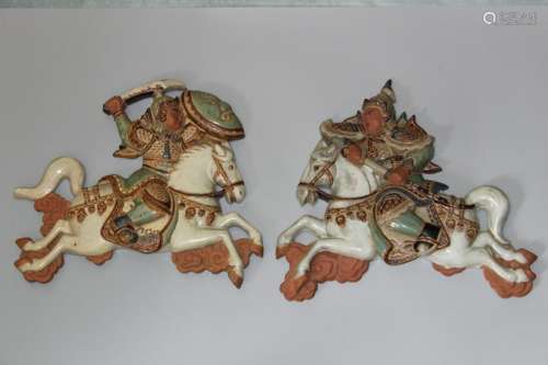 A pair of Chinese porcelain horse riders