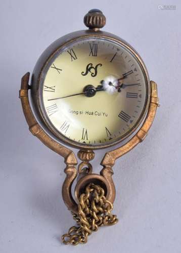 A BALL CLOCK. 1.5 cm wide.