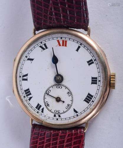 A 1950S 9CT GOLD WRISTWATCH. 3 cm diameter.