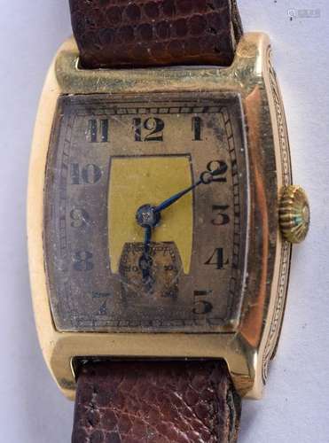 A 1950S 14CT GOLD WRISTWATCH with silvered dial and