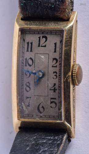 A 1950S 14CT GOLD WRISTWATCH with silvered dial and