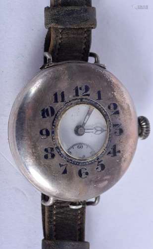 A WWII SILVER AND ENAMEL HALF HUNTER TRENCH WRISTWATCH.