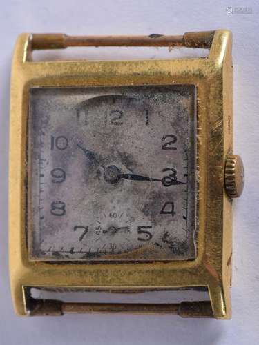 A 1950S 18CT GOLD LONGINES WATCH with silvered dial.