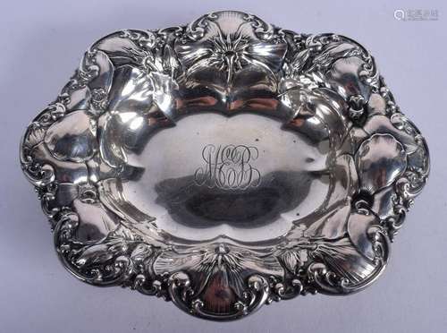 A VINTAGE SILVER EMBOSSED DISH. 4 oz. 17 cm wide.