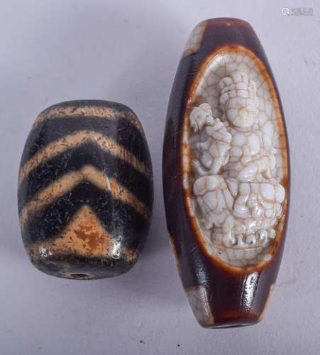 TWO CHINESE AGATE TIBETAN BEADS. 5 cm & 3 cm wide. (2)