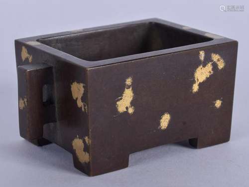 A CHINESE GOLD SPLASH BRONZE CENSER. 7 cm wide.