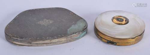 A SILVER COMPACT and another. (2)