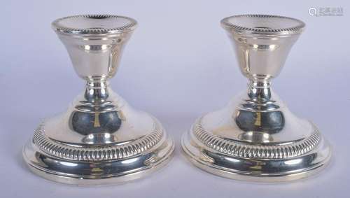 A PAIR OF VINTAGE SILVER CANDLESTICKS. 9 cm high.