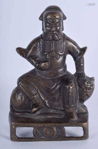 A CHINESE BRONZE GUARDIAN FIGURE. 16 cm x 9 cm.