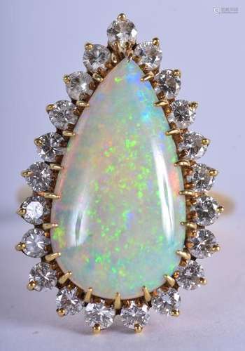 AN 18CT GOLD DIAMOND AND OPAL RING. 6.7 grams. O. Opal