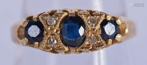 AN 18CT GOLD DIAMOND AND SAPPHIRE RING. 2.6 grams. O.