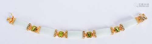 A VINTAGE SILVER GILT JADEITE AND PERIDOT BRACELET. 21