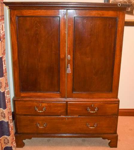 A GEORGE III CUPBOARD ON STAND, formed with two short