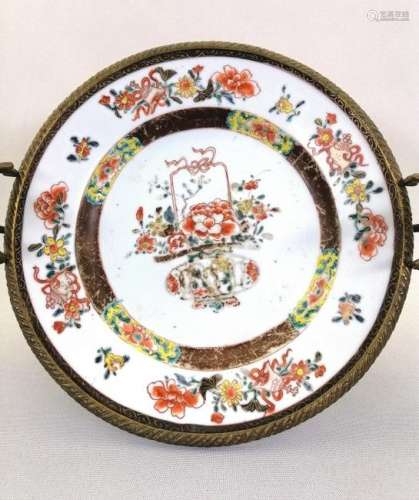A Chinese export rose medallion plate in metal mot