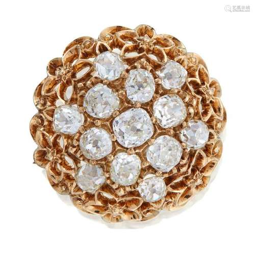 An eighteen karat gold and diamond brooch,